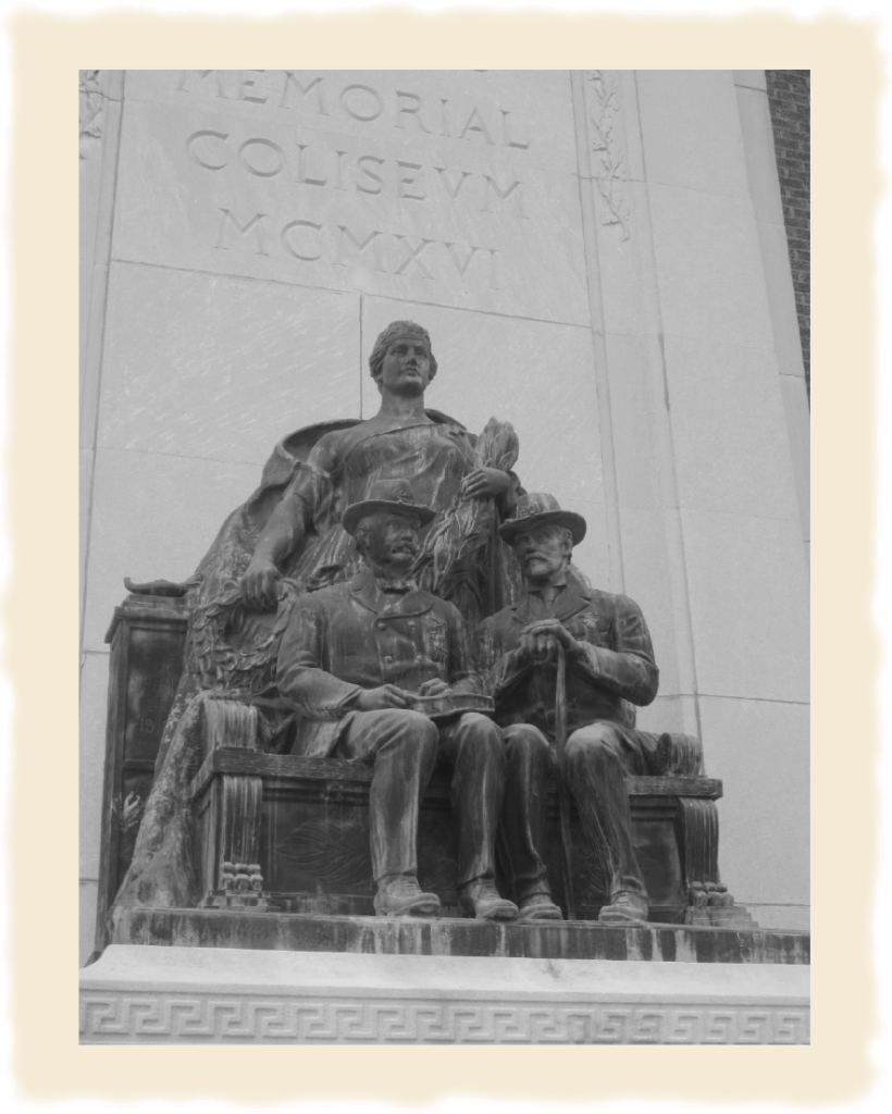 Bronze statue of two veterans on the steps of the Coliseum